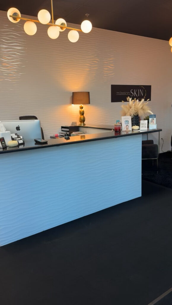 Clean, professional medical spa treatment room with neutral tones at Confidence Aesthetics Llc in Overland Park